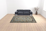 9' x 12' Orange and Ivory Floral Power Loom Area Rug