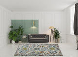 8' x 11' Orange and Ivory Floral Power Loom Area Rug