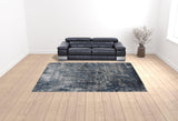 10' x 14' Gray and Orange Abstract Power Loom Area Rug