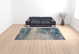 9' x 12' Blue and Gray Abstract Power Loom Area Rug