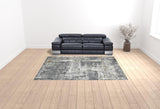 9' x 12' Gray and Ivory Abstract Power Loom Area Rug