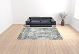 9' x 12' Gray and Ivory Abstract Power Loom Area Rug