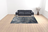 9' x 12' Gray and Orange Abstract Power Loom Area Rug