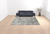 9' x 12' Gray and Orange Abstract Power Loom Area Rug