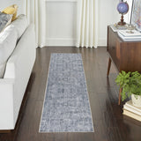 6' x 9' Blue and Off White Geometric Power Loom Washable Area Rug