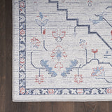 6' x 9' Ivory and Blue Oriental Power Loom Washable Area Rug