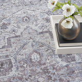 10' Blue and Ivory Floral Power Loom Distressed Washable Runner Rug