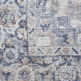 9' x 12' Blue and Ivory Floral Power Loom Distressed Washable Area Rug