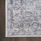 9' x 12' Beige and Ivory Floral Power Loom Distressed Washable Area Rug