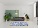 6' x 9' Blue and Off White Floral Power Loom Washable Non Skid Area Rug