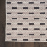 5' x 7' Ivory and Brown Geometric Power Loom Washable Non Skid Area Rug