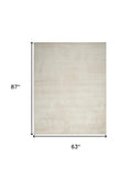5' x 7' Cream Abstract Area Rug