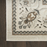 4' x 6' Cream Floral Distressed Area Rug