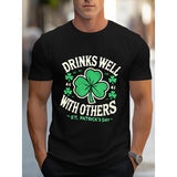 [Festive T Shirt] Casual Cheerful St. Patrick's Day Short Sleeve T - Shirt "Drinks Well with Others" with Clover Print Made in USA