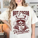 Vintage Hot Cocoa Weather with Noel Raccoon Graphics T-shirt, Christmas Raccoon Shirt, Hot Cocoa Season Raccoon Lovers T-shirt, Trendy Christmas Coffee Weather T-shirt Cotton Top Cotton Top