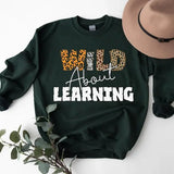 Wild About Learning At School Shirt, 2024 Funny First Day Of School Shirt, Teacher Love Inspire Tshirt Fabric Casual Classic